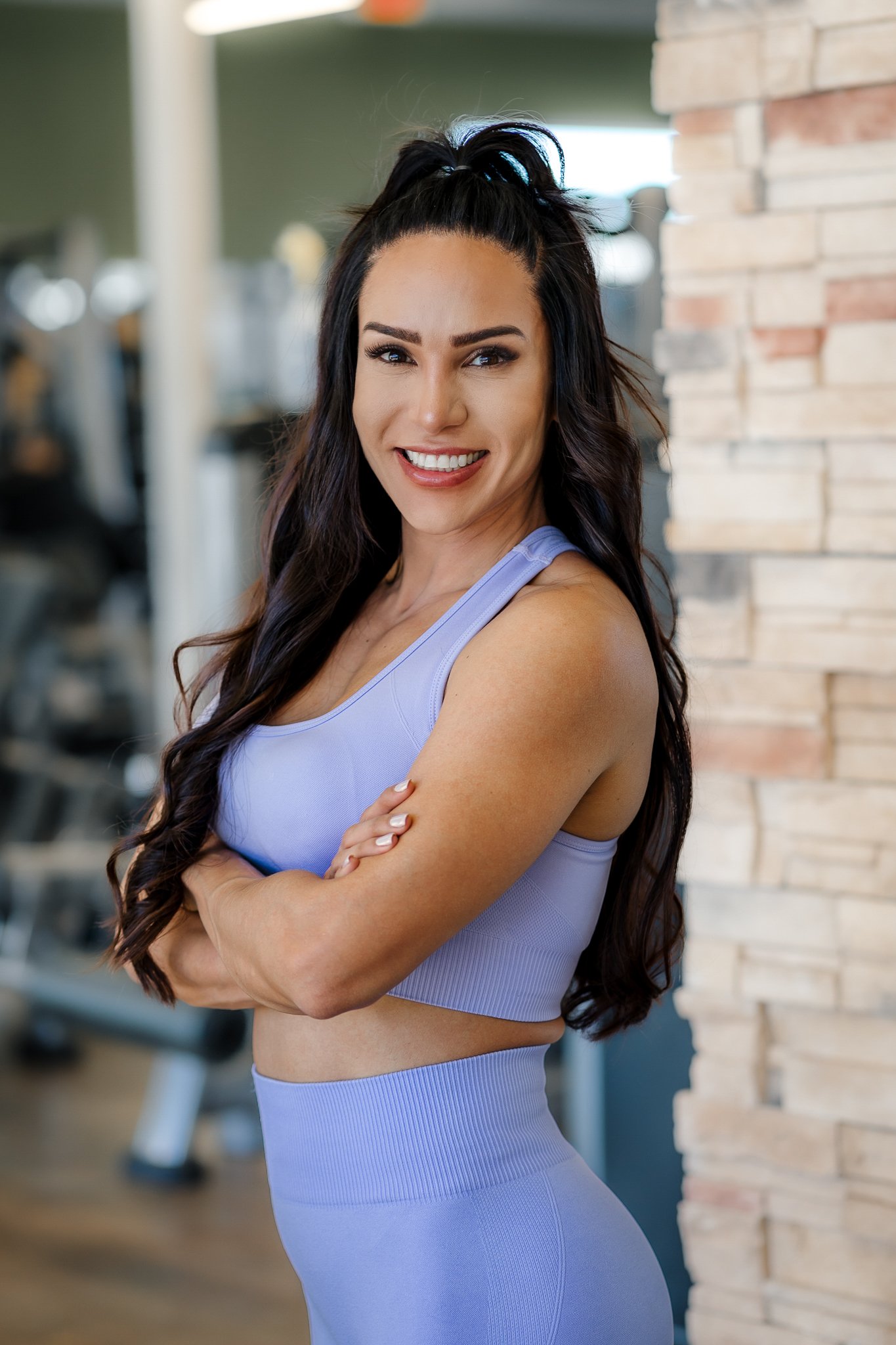 Lorena, founder of Xculpted, smiling